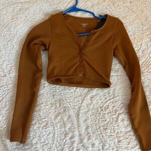 Urban outfitters long sleeve cropped out from under top